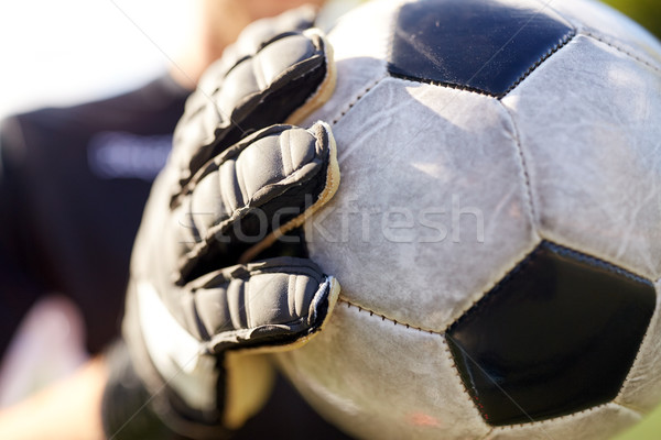 close up of goalkeeper with ball playing football Stock photo © dolgachov