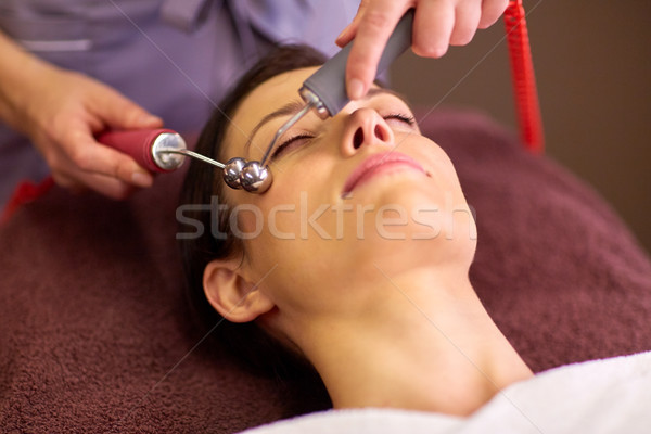 woman having hydradermie facial treatment in spa Stock photo © dolgachov