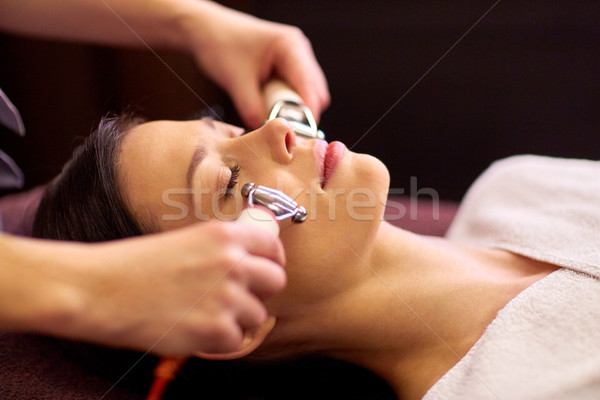 Stock photo: woman having hydradermie facial treatment in spa