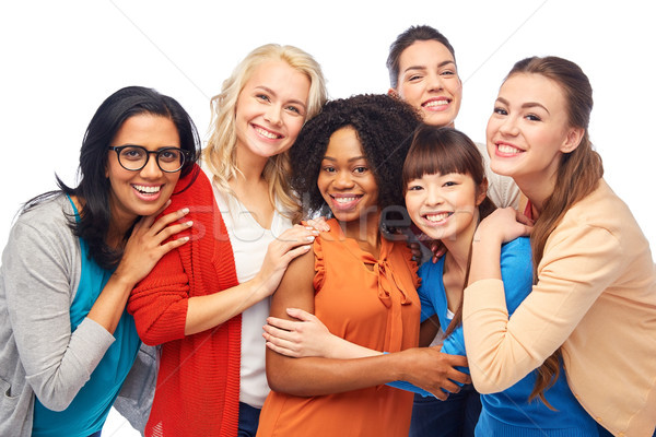 Stock photo: international group of happy women hugging