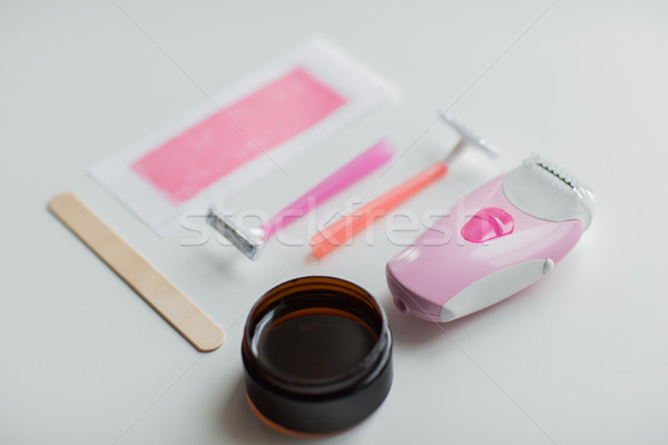 hair removal wax, epilator and safety razor Stock photo © dolgachov
