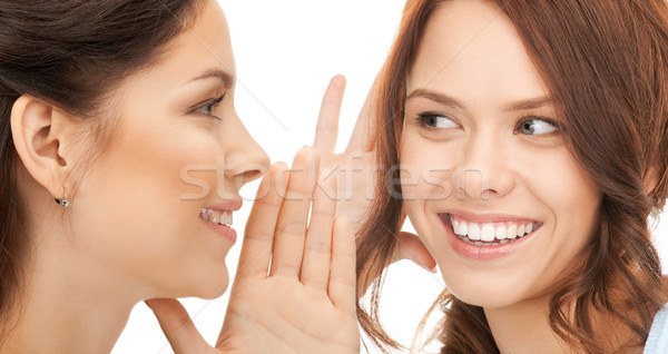 two women spreading gossip Stock photo © dolgachov