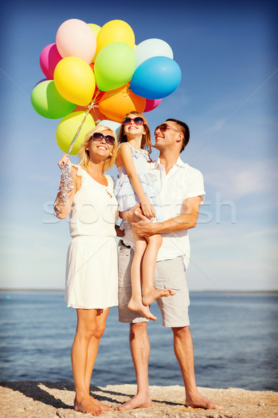 Gelukkig gezin kleurrijk ballonnen zomer vakantie Stockfoto © dolgachov