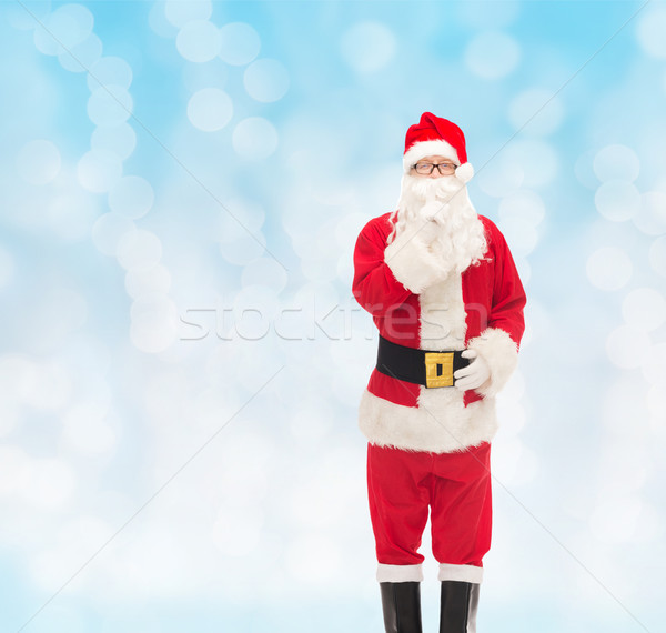 man in costume of santa claus Stock photo © dolgachov