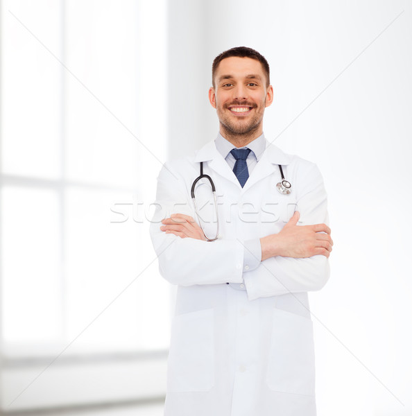 smiling male doctor with stethoscope Stock photo © dolgachov