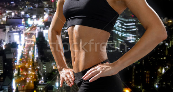Közelkép sportos női sportruha fitnessz diéta Stock fotó © dolgachov