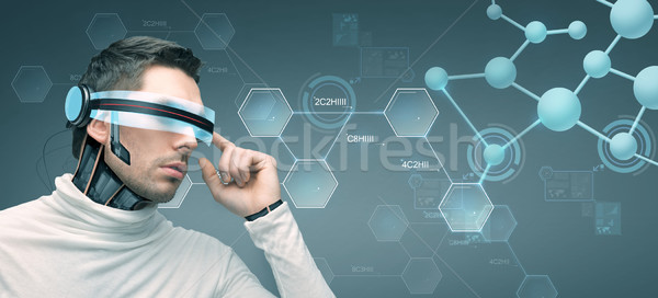 man with futuristic 3d glasses and sensors Stock photo © dolgachov