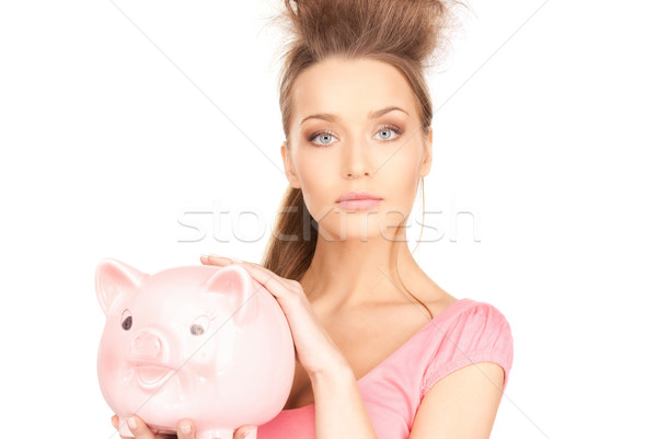 lovely woman with piggy bank Stock photo © dolgachov