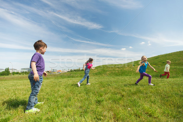 Groupe heureux enfants courir extérieur été [[stock_photo]] © dolgachov