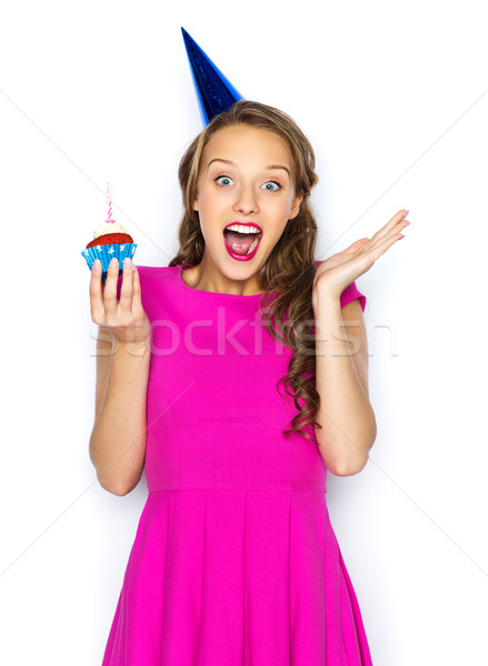 happy woman or teen girl with birthday cupcake Stock photo © dolgachov