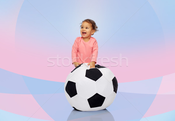 happy mulatto little baby girl playing with ball Stock photo © dolgachov