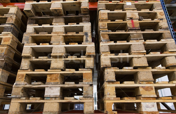 Stock photo: wooden cargo pallets storing at warehouse shelves