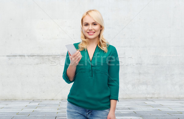счастливым женщину смартфон люди технологий связи Сток-фото © dolgachov