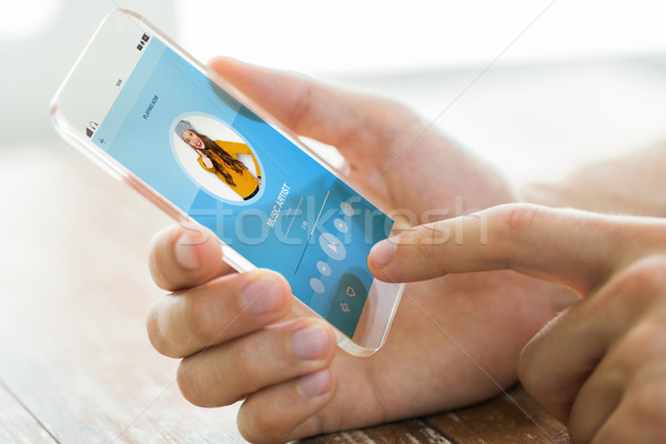 Hand muziekspeler smartphone technologie moderne Stockfoto © dolgachov