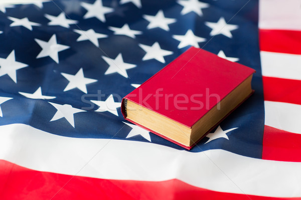 close up of american flag and book Stock photo © dolgachov