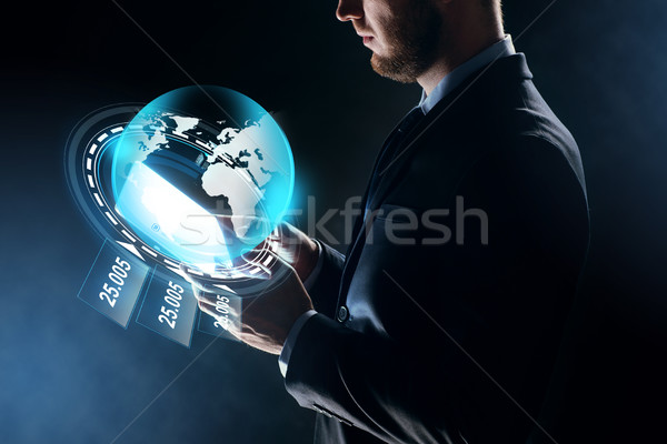 Zakenman aarde hologram zakenlieden netwerk Stockfoto © dolgachov