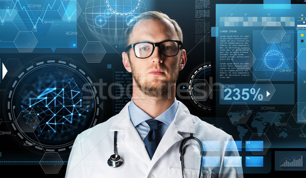 close up of doctor in white coat with stethoscope Stock photo © dolgachov