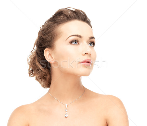 Kobieta błyszczący diament naszyjnik Zdjęcia stock © dolgachov