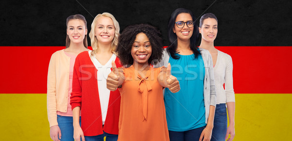 international german women showing thumbs up Stock photo © dolgachov