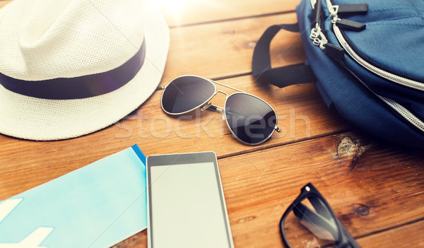 close up of gadgets and traveler personal stuff Stock photo © dolgachov