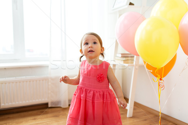happy baby girl on birthday party at home Stock photo © dolgachov