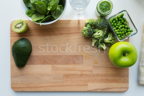 Stock photo: vegetable puree or baby food and fruits on board