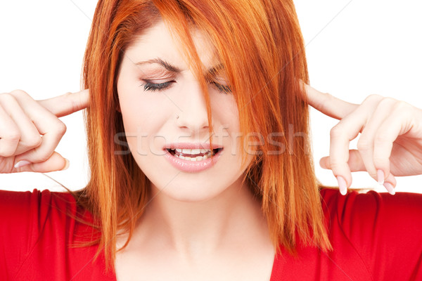 Infelice donna foto dita orecchie Foto d'archivio © dolgachov