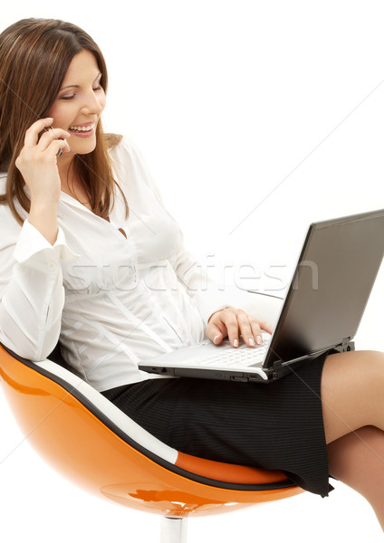 Foto stock: Empresária · laptop · telefone · laranja · cadeira · branco