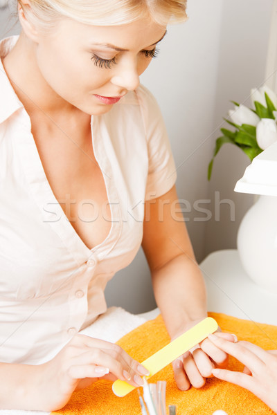 woman having a manicure at the salon  Stock photo © dolgachov