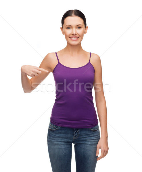 Uśmiechnięty dziewczyna fioletowy zbiornika górę odzież Zdjęcia stock © dolgachov