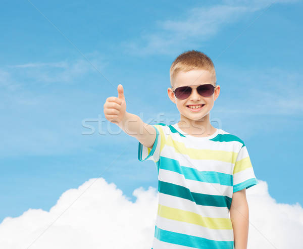 smiling cute little boy in sunglasses Stock photo © dolgachov