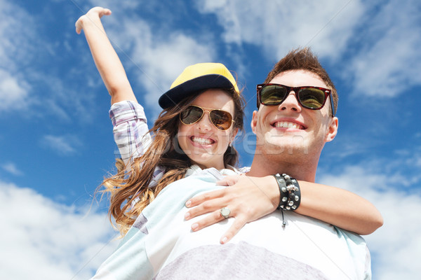 teenagers having fun outside Stock photo © dolgachov