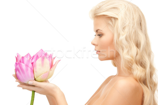 beautiful woman with lotus flower Stock photo © dolgachov