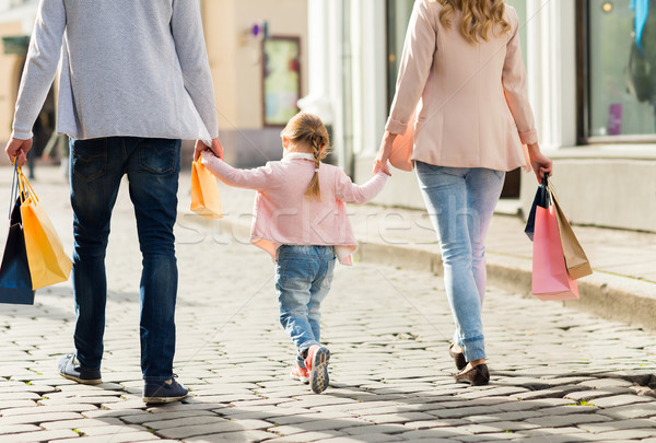 close up of family with child shopping in city Stock photo © dolgachov