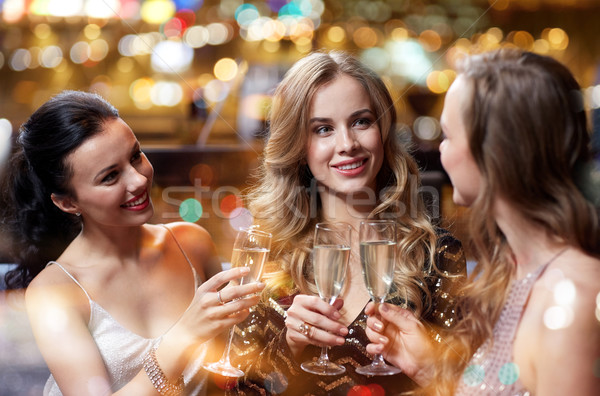 Сток-фото: счастливым · женщины · шампанского · очки · ночной · клуб · празднования