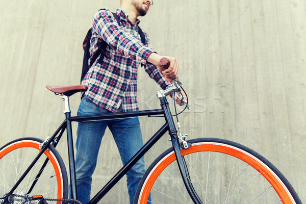 Homme fixé engins vélo sac à dos [[stock_photo]] © dolgachov