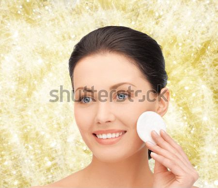 beautiful young woman face over white background Stock photo © dolgachov