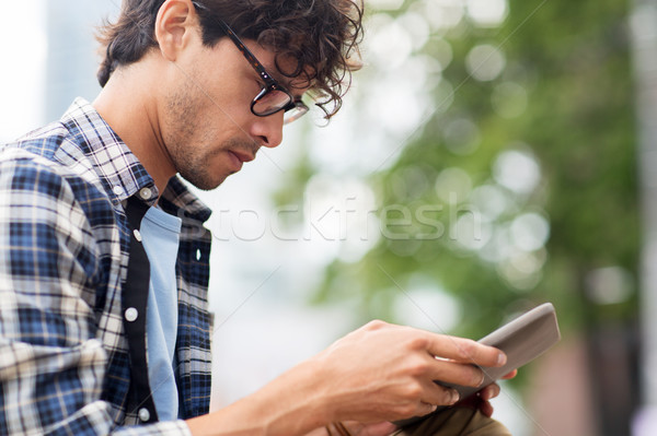 close up of man with tablet pc outdoors Stock photo © dolgachov