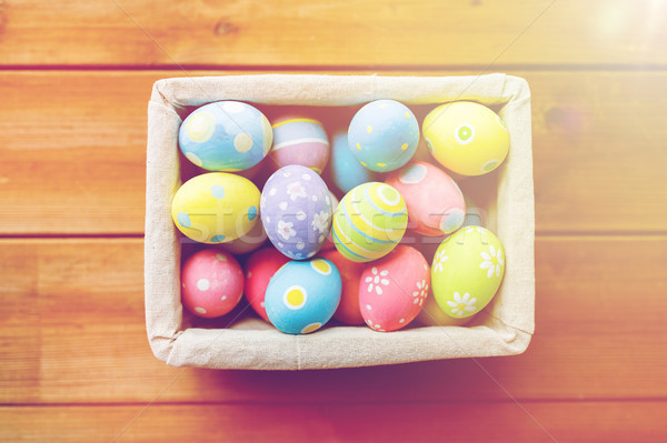 close up of colored easter eggs in basket Stock photo © dolgachov