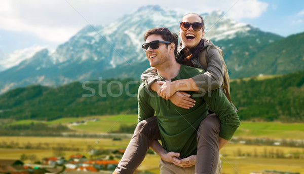 happy couple with backpacks traveling in highlands Stock photo © dolgachov