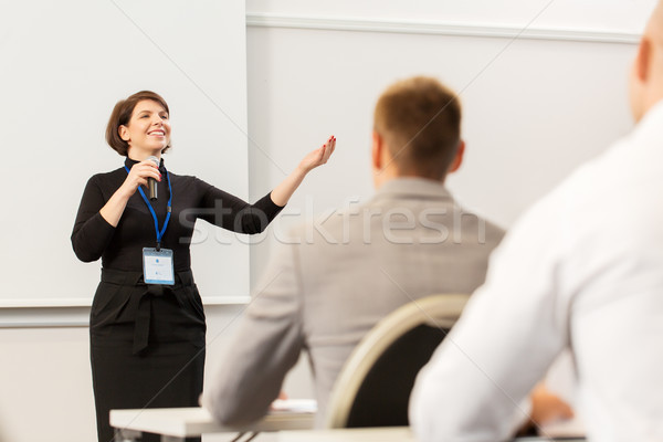 group of people at business conference or lecture Stock photo © dolgachov