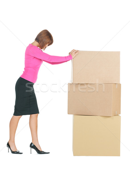 Stock photo: attractive businesswoman with big boxes