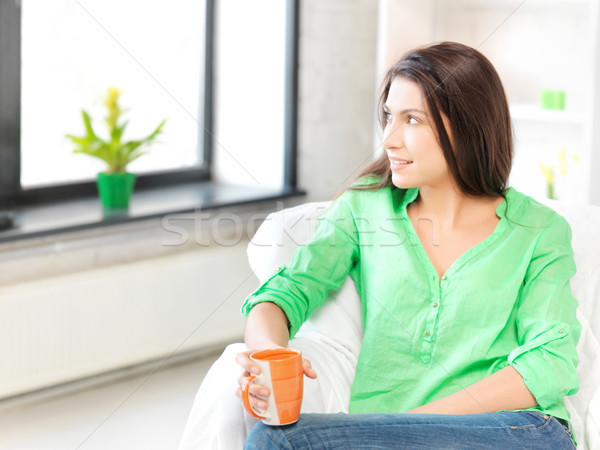 lovely woman with mug Stock photo © dolgachov