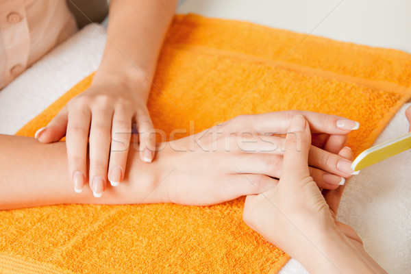 Manikűr folyamat női kezek közelkép kép Stock fotó © dolgachov