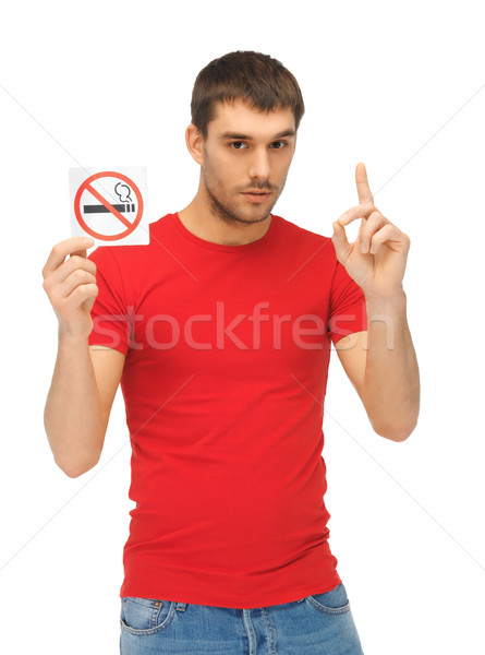 man in red shirt with no smoking sign Stock photo © dolgachov