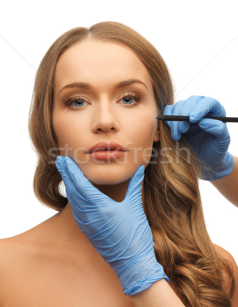 Stock photo: woman face and beautician hands