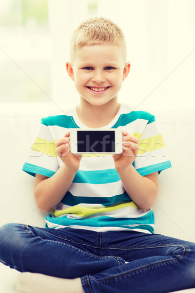 little boy showing smartphone black blank screen Stock photo © dolgachov