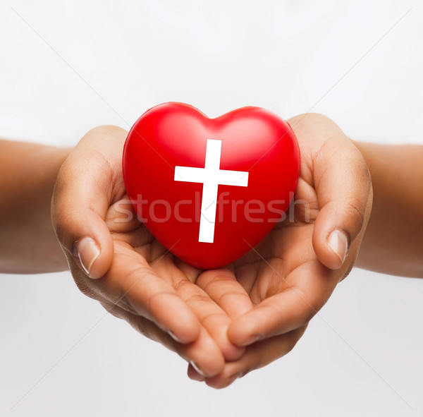 женщины рук сердце крест символ Сток-фото © dolgachov