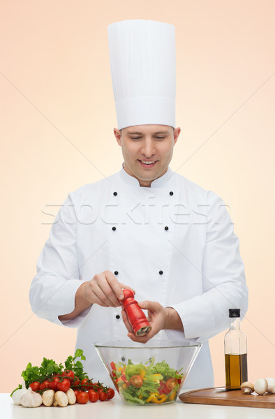 happy male chef cook cooking food Stock photo © dolgachov