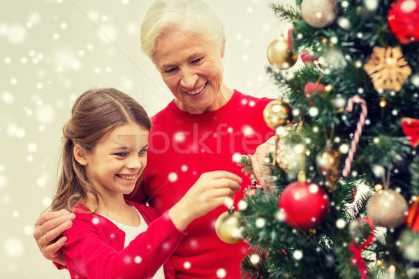 Lächelnd Familie Weihnachtsbaum home Feiertage Generation Stock foto © dolgachov